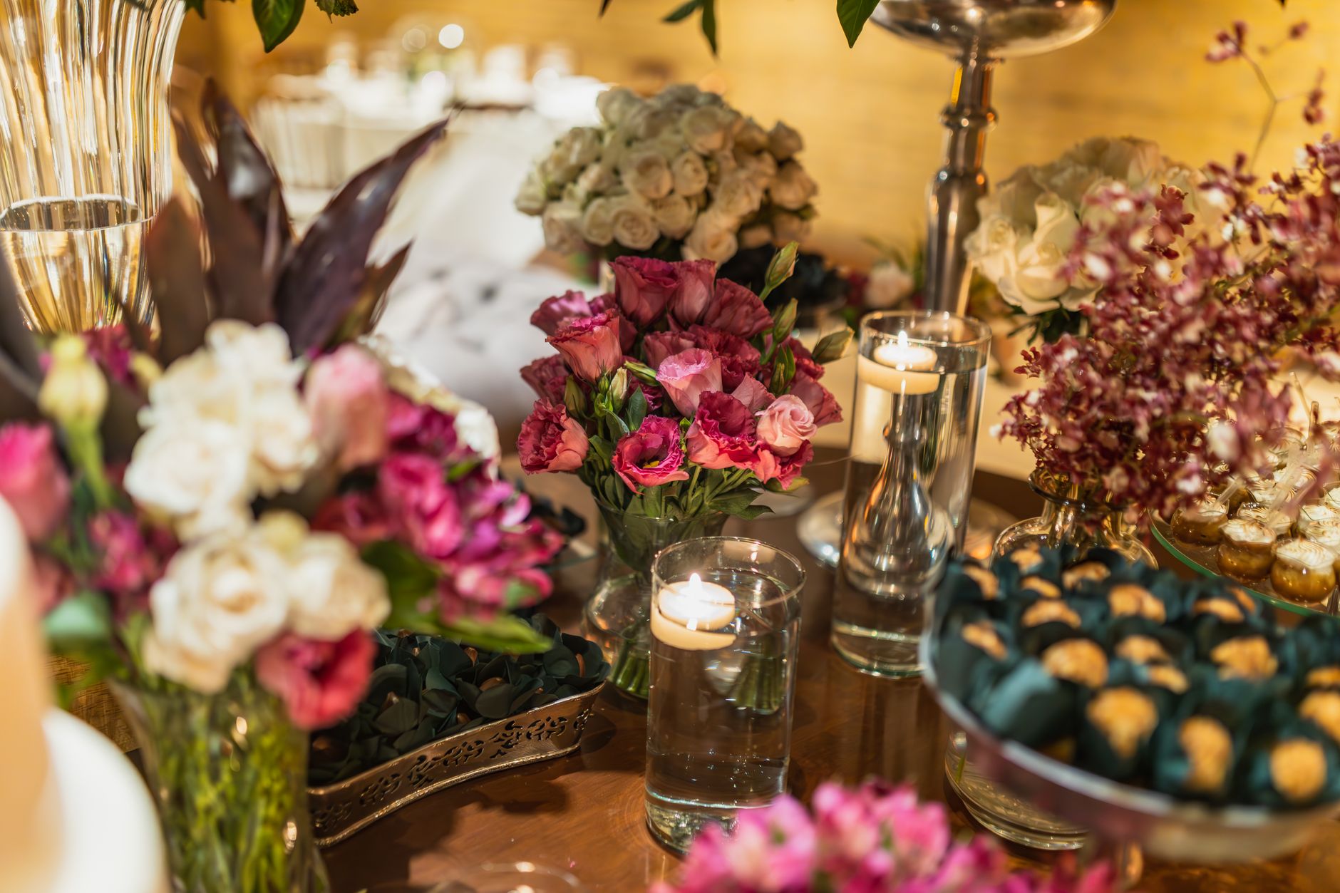 A floral centrepiece arranged in a footed urn